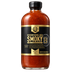 A bottle of Lillies Bourbon Barrel Aged Smoky BBQ sauce, featuring a black label with gold lettering and a black cap, set against a plain white background.